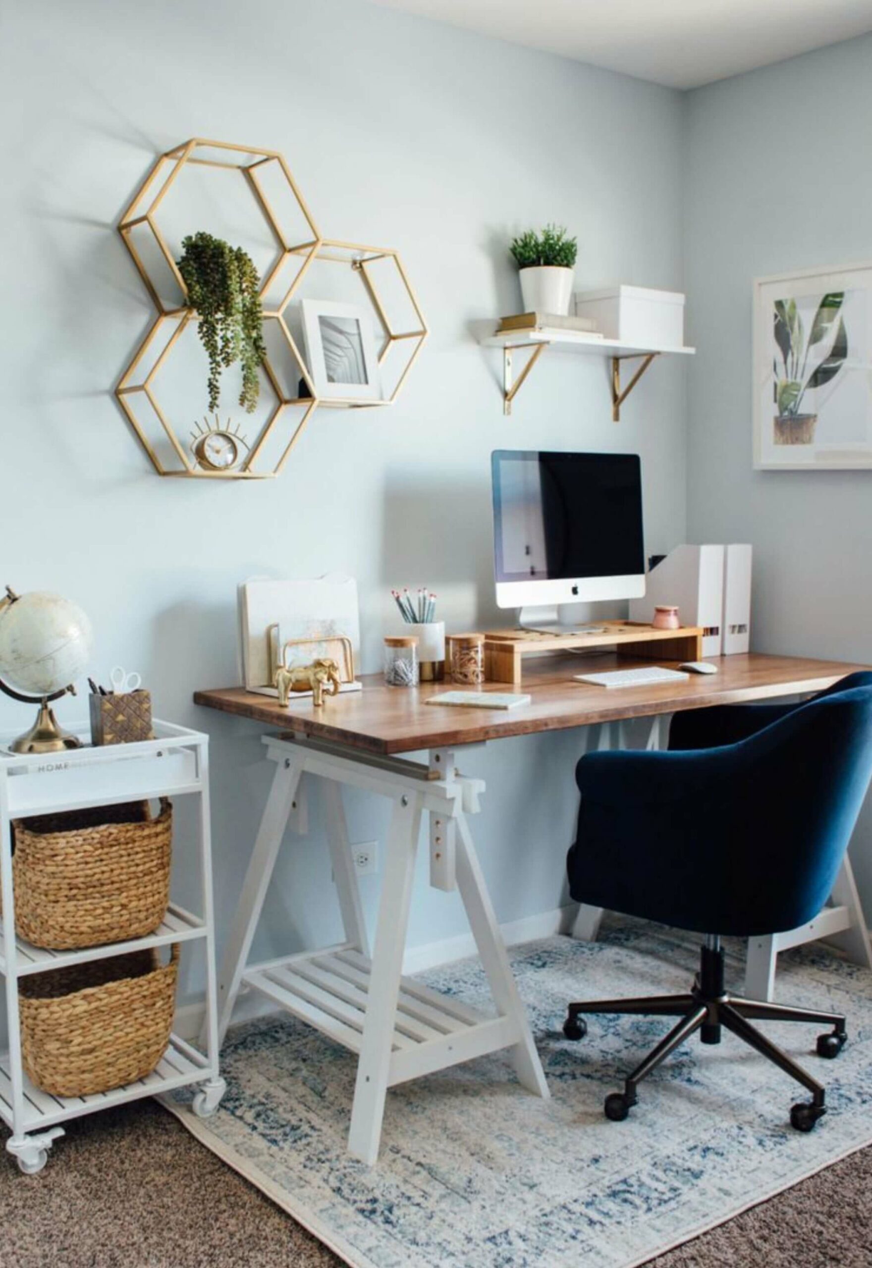 home office set up with gold and beige decorations